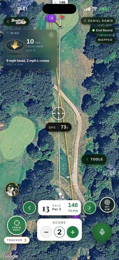 Clean satellite hole view with wind HUD, aim crosshair, and live distances